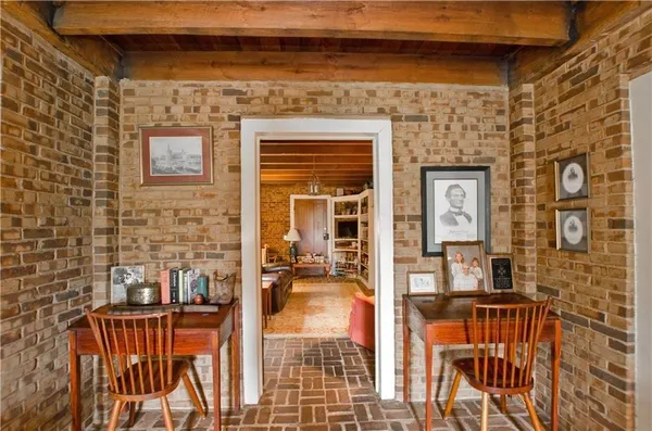 a front view of house with yard and garage