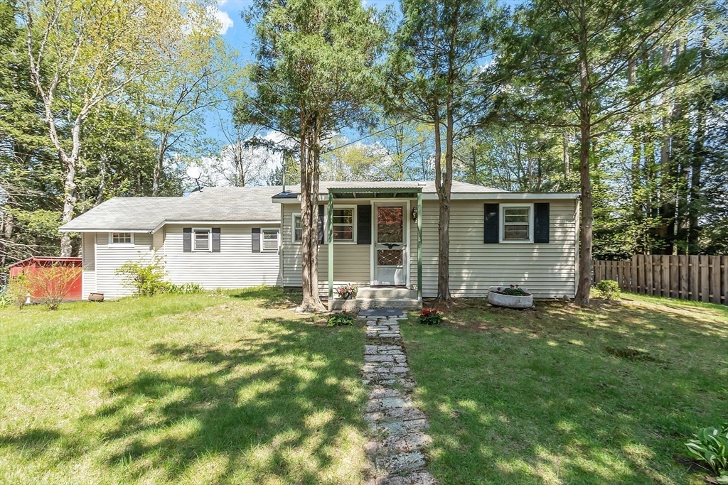 146 Horton Road Orange, MA 01364 - Photo 38 of 40 a front view of a house with a garden
