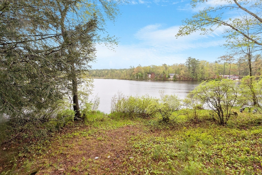 146 Horton Road Orange, MA 01364 - Photo 40 of 40 a view of a lake with houses in the back