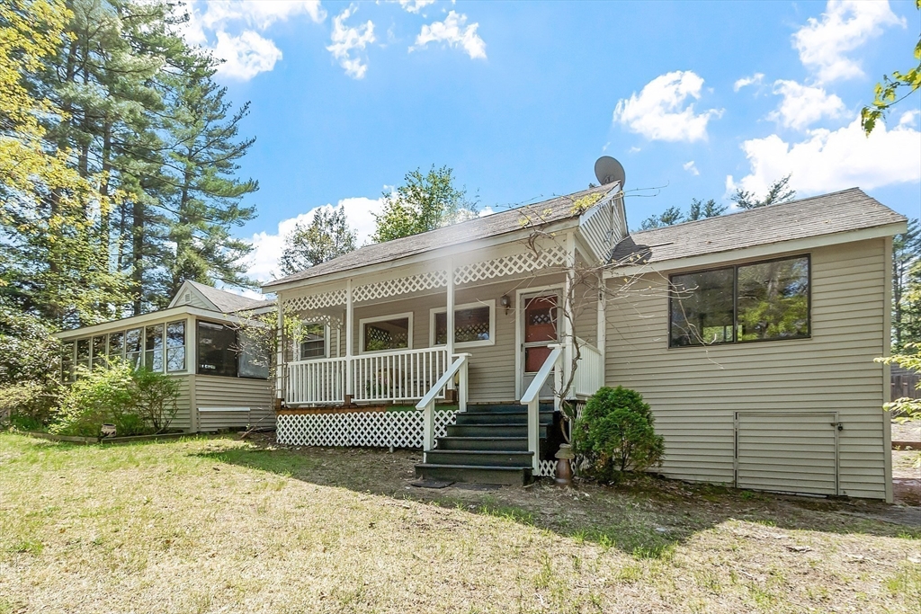 146 Horton Road Orange, MA 01364 - Photo 8 of 40 a view of a house with a yard