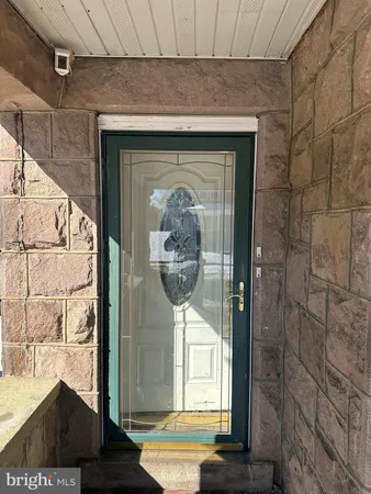 a front view of a house with wooden floor