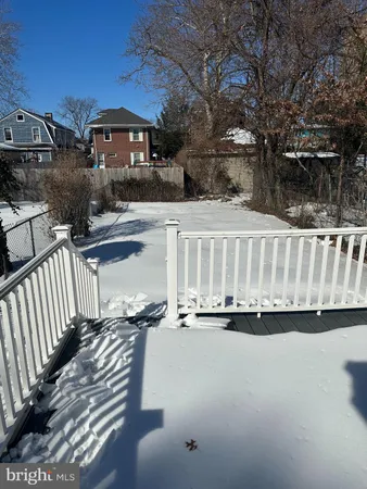 a view of balcony with wooden floor