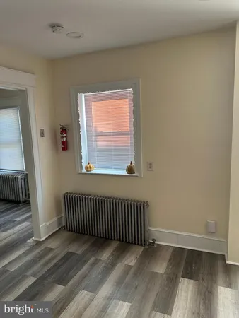 a kitchen with stainless steel appliances a stove a sink and a refrigerator