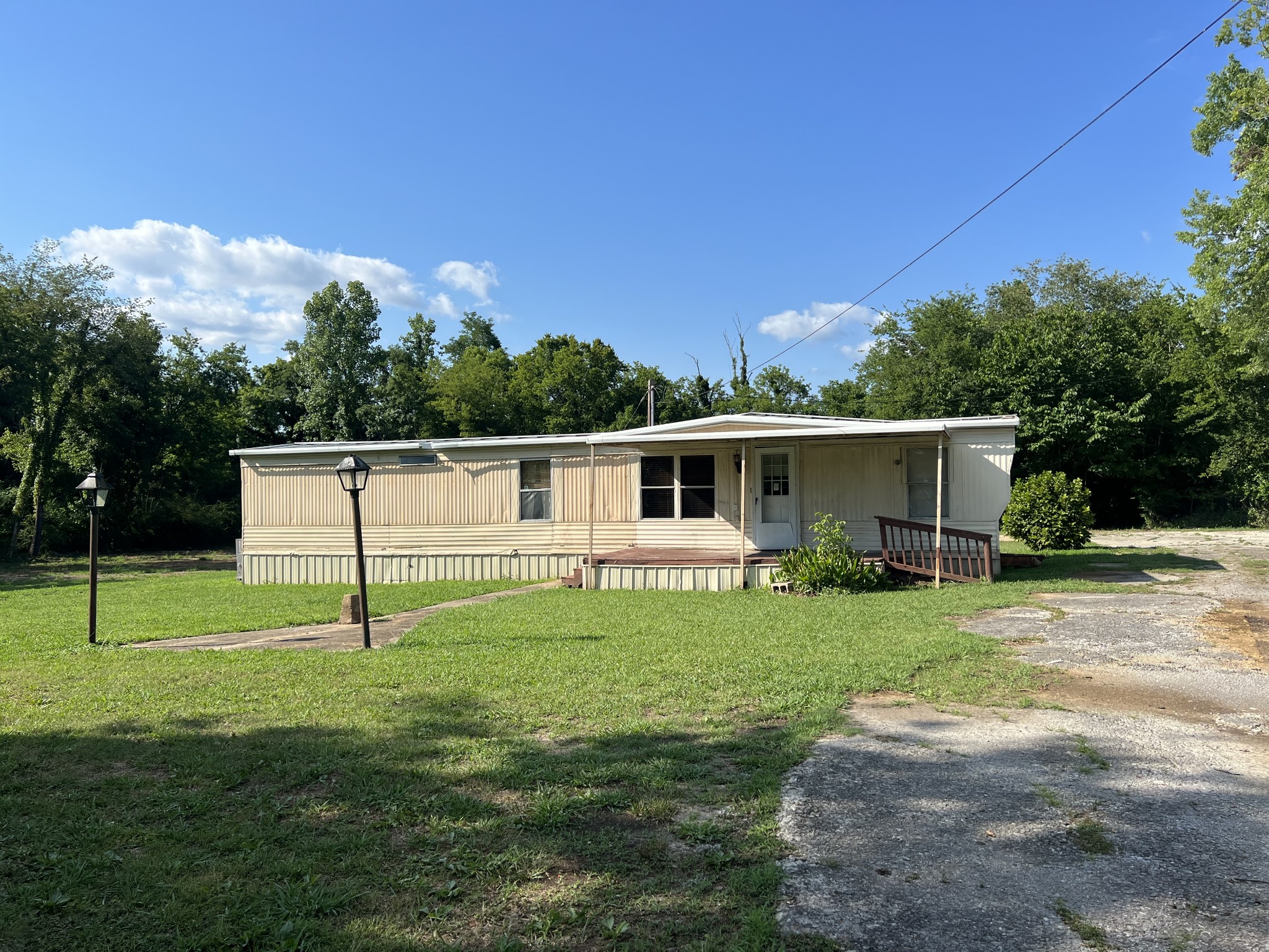 20 Providence Road Fayetteville, TN 37334 - Photo 1 of 19 a house view with a play ground in front of it