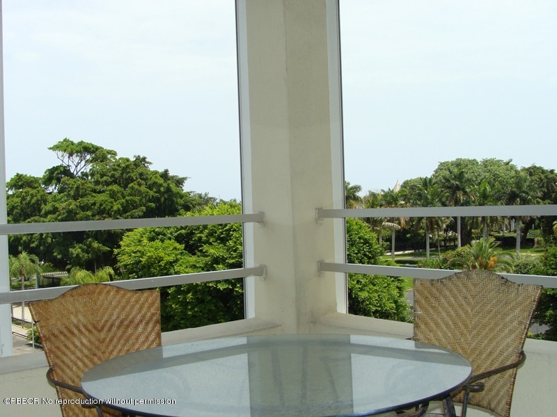 44 Cocoanut Row, Unit 322B Palm Beach, FL 33480 - Photo 1 of 10 an outdoor view from balcony with seating space