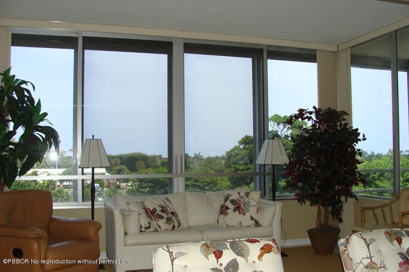 44 Cocoanut Row, Unit 322B Palm Beach, FL 33480 - Photo 3 of 10 a living room with furniture and a potted plant