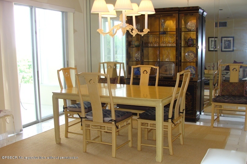 44 Cocoanut Row, Unit 322B Palm Beach, FL 33480 - Photo 4 of 10 a view of a dining room with furniture and a window