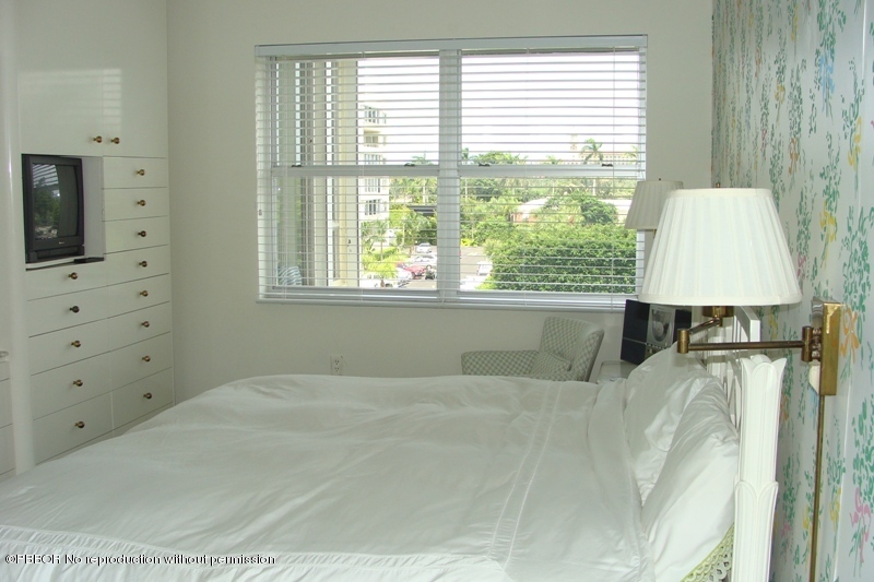 44 Cocoanut Row, Unit 322B Palm Beach, FL 33480 - Photo 7 of 10 a bedroom with a bed and a window