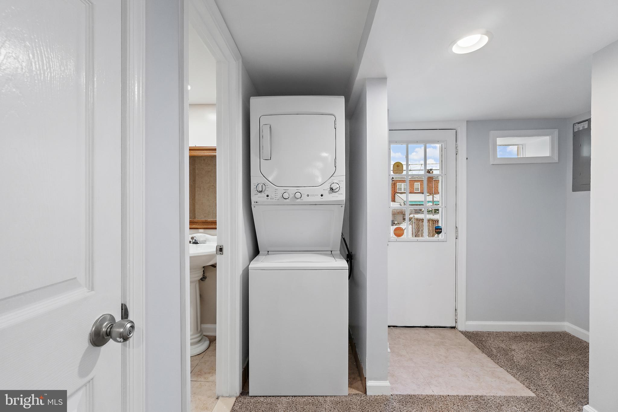 140 West Edgevale Road Brooklyn, MD 21225 - Photo 20 of 30 Stacked washer/dryer on lower level