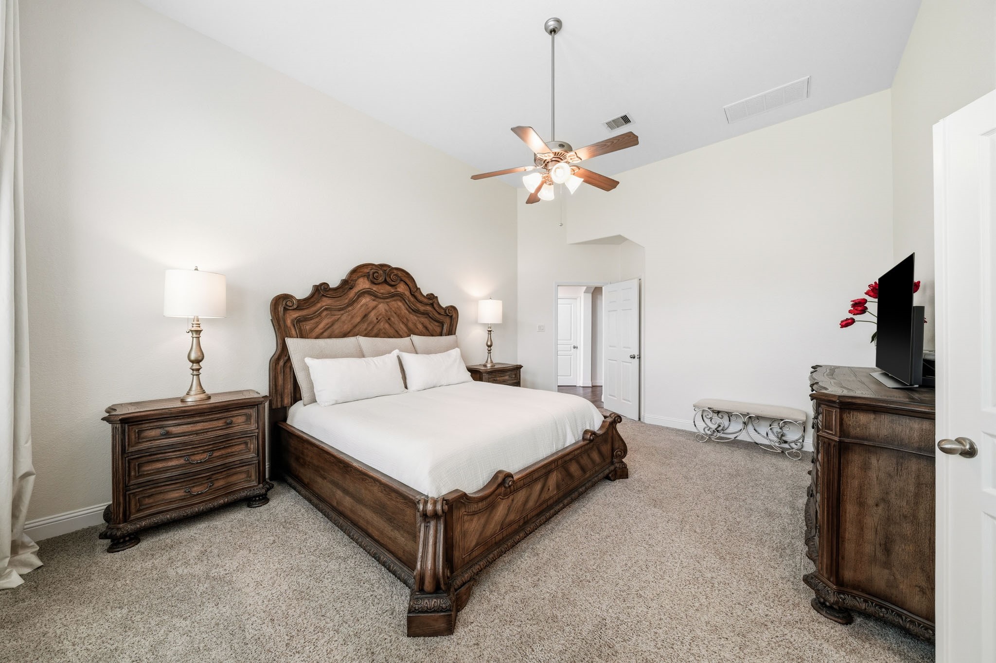 17610 Strackfield Lane Tomball, TX 77377 - Photo 22 of 50 Designed as a private sanctuary, the primary suite showcases tall ceilings and an airy ambiance, creating the perfect place to unwind at the end of the day.