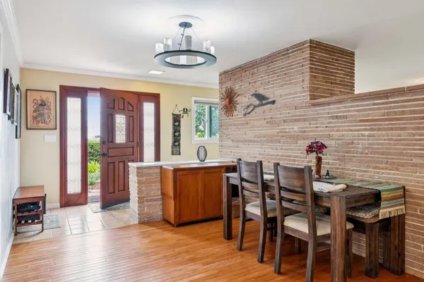 a kitchen with stainless steel appliances a stove cabinets and a refrigerator