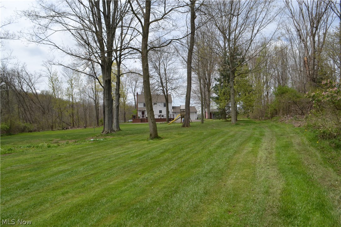 3995 Ridge Road Medina, OH 44256 - Photo 32 of 35 Such an awesome yard for entertaining. Plenty of space for croquet, sand volleyball, badminton and a tent for special celebrations.