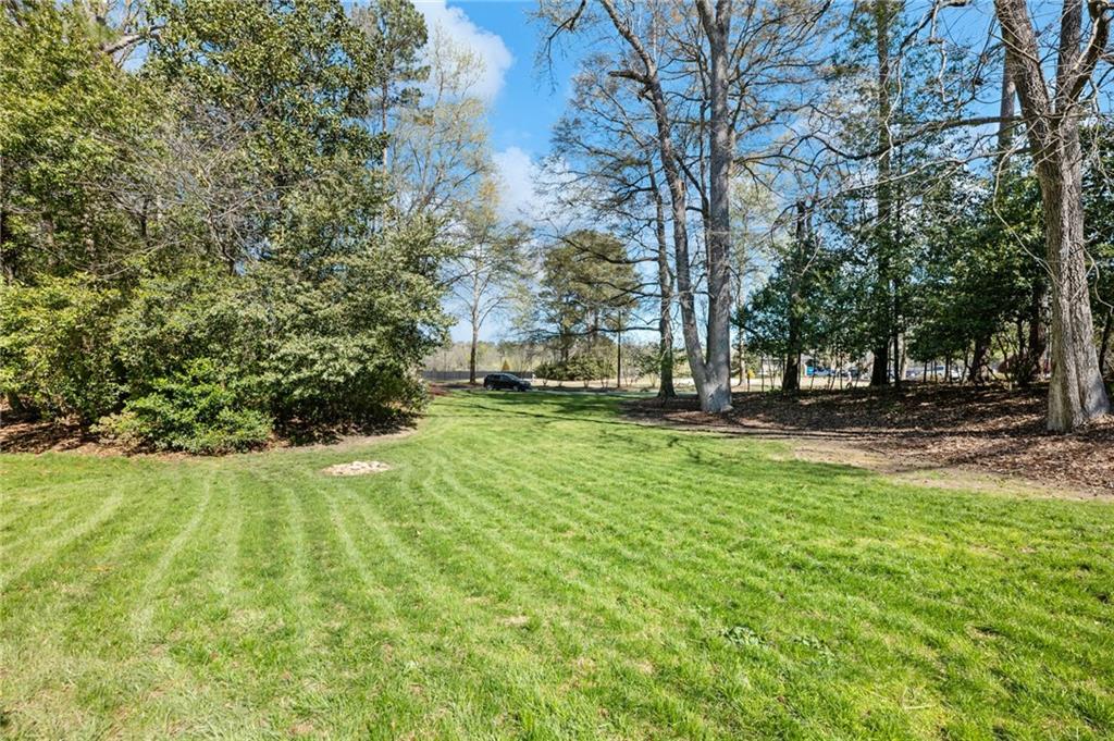 162 Amherst Place Northwest Atlanta, GA 30327 - Photo 18 of 24 a view of yard with green space