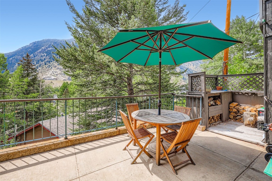 819 Valley View Drive Georgetown, CO 80444 - Photo 5 of 29 a view of a chairs and table in the balcony