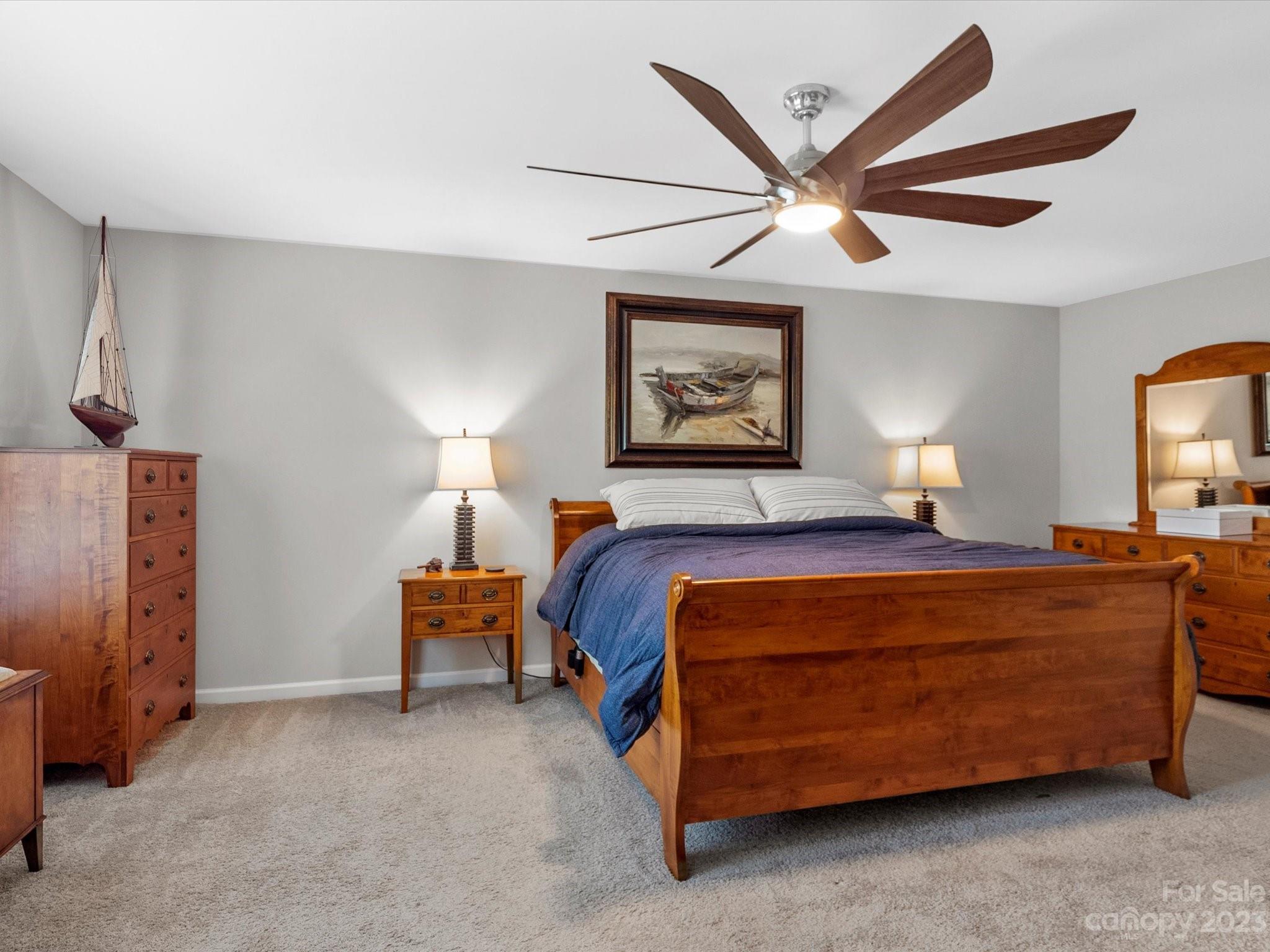 6020 Gribble Lane Lancaster, SC 29720 - Photo 21 of 32 a bed room with a bed and lamp