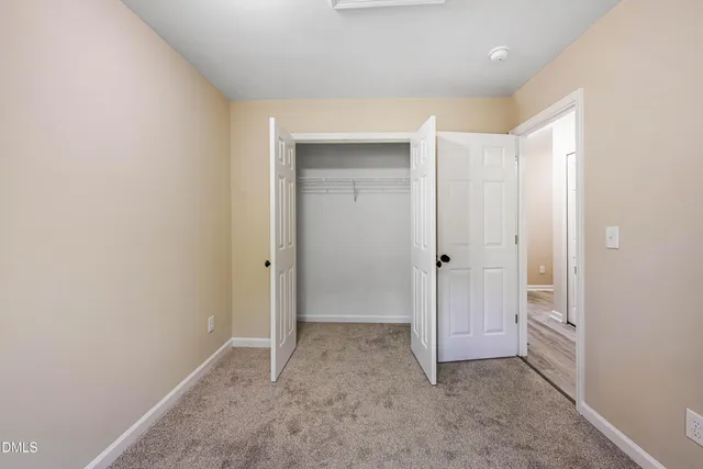 an empty room with closet