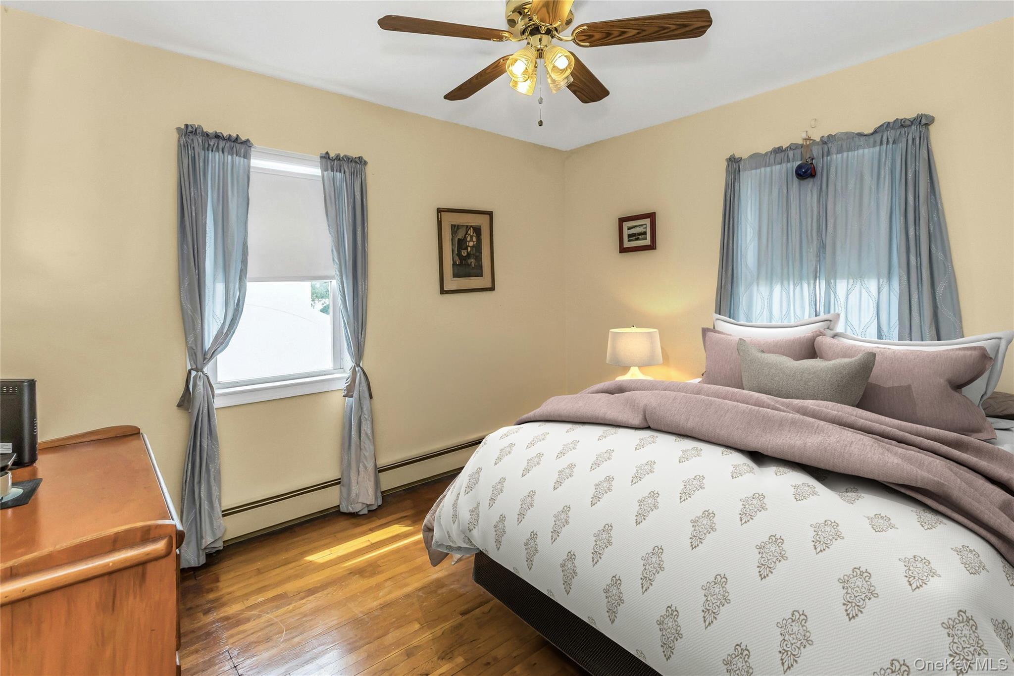 97 Horton Road Valley Stream, NY 11581 - Photo 15 of 21 a bedroom with a bed and a window