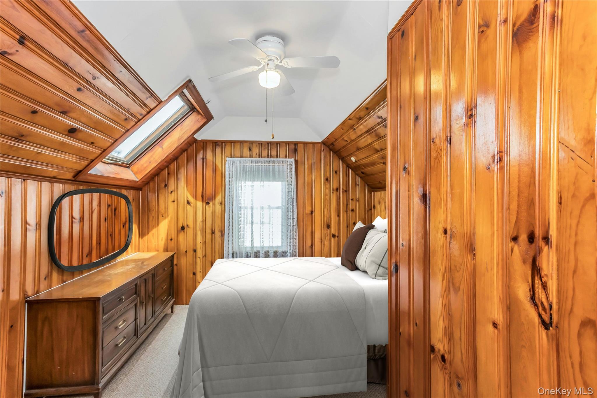 97 Horton Road Valley Stream, NY 11581 - Photo 17 of 21 a bedroom with a bed a dresser and potted plants