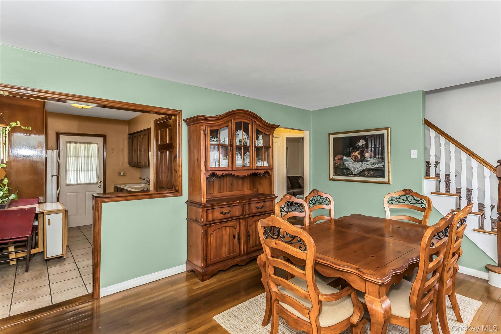97 Horton Road Valley Stream, NY 11581 - Photo 4 of 21 a dining room with furniture and wooden floor