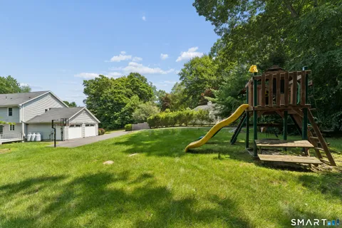 a picture of a bench in front of gate