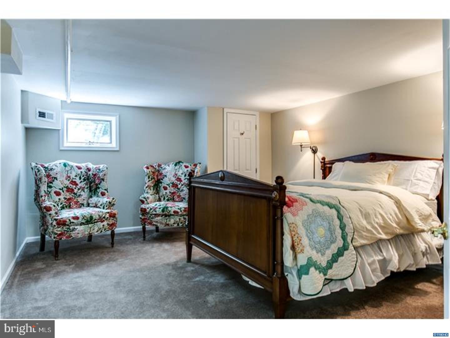 121 Hamilton Road Landenberg, PA 19350 - Photo 23 of 25 a bedroom with bed and a couch