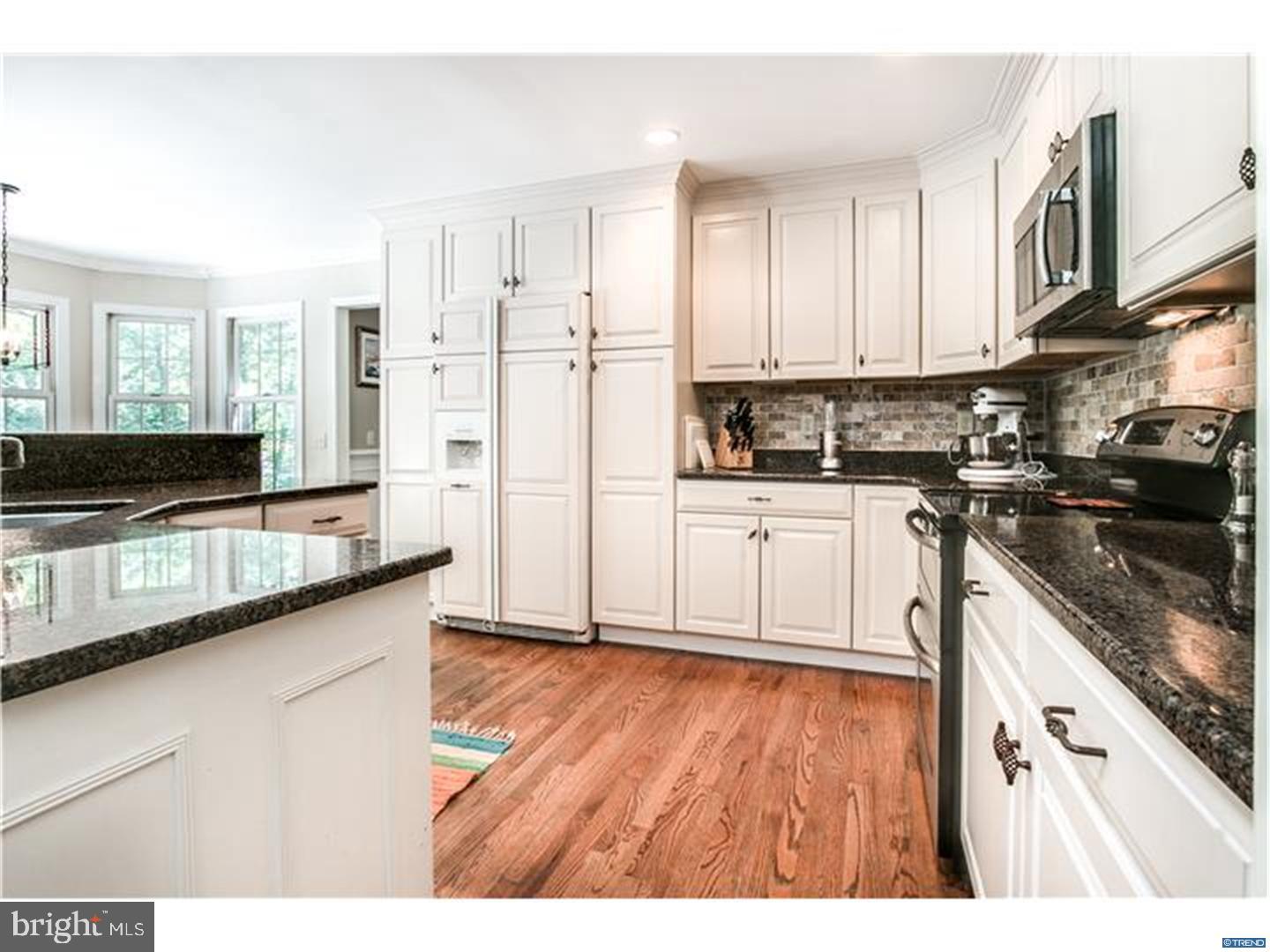 121 Hamilton Road Landenberg, PA 19350 - Photo 7 of 25 a kitchen with granite countertop a sink stove and refrigerator