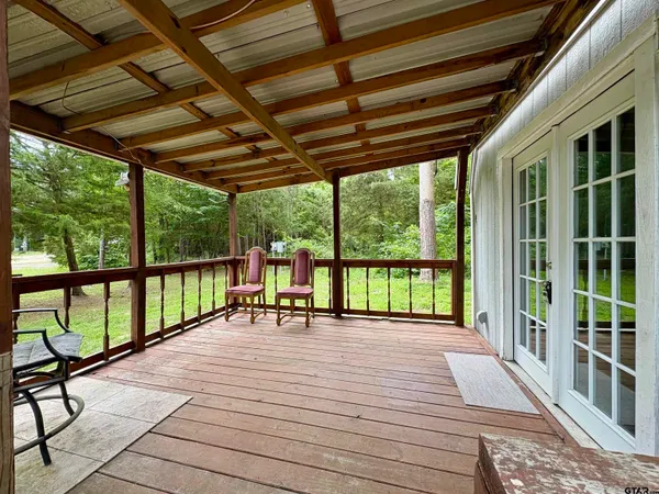 a view of porch with deck