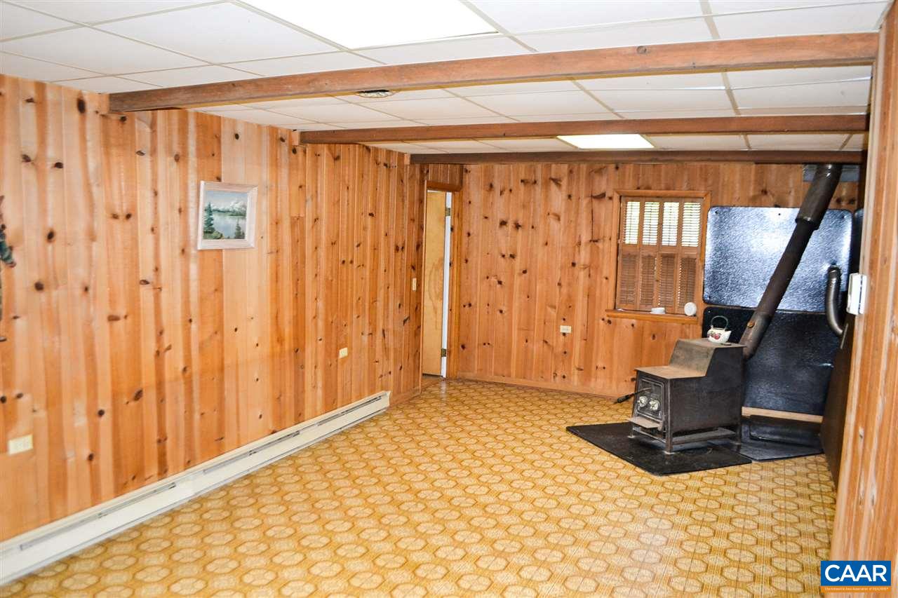 5281 Fredericksburg Road Ruckersville, VA 22968 - Photo 24 of 48 a view of a entryway with wooden walls