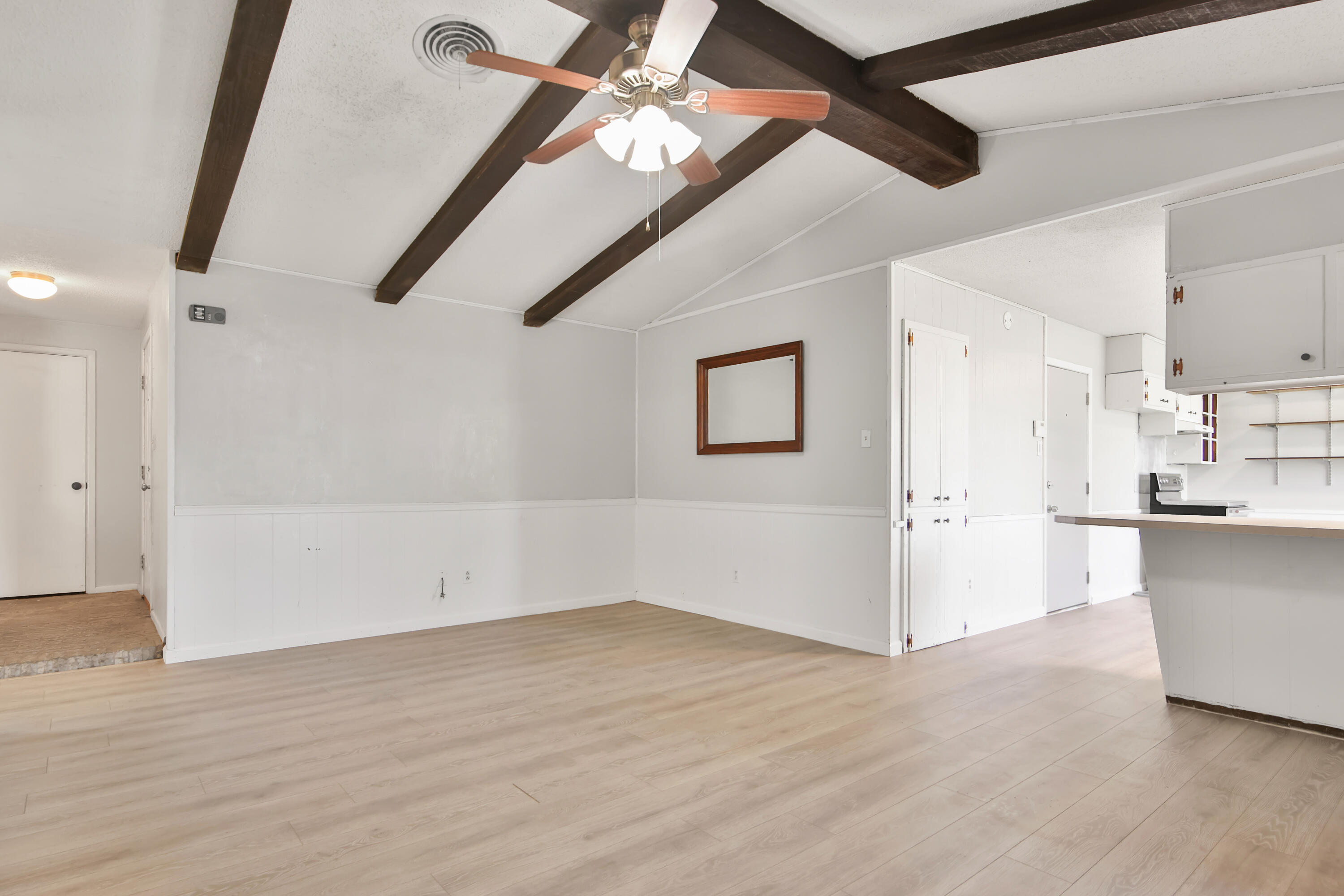 6607 Avenue U Lubbock, TX 79412 - Photo 6 of 25 a view of empty room with wooden floor