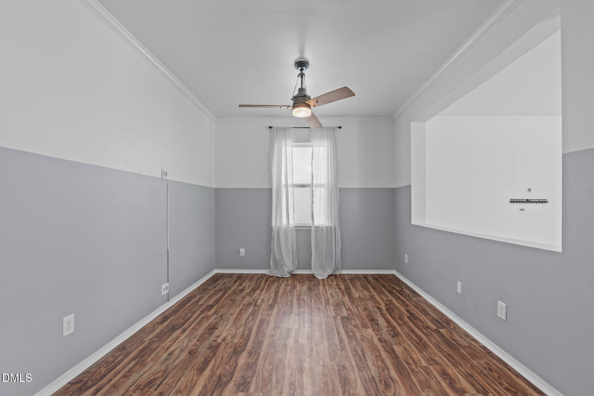 124 Daneborg Road Durham, NC 27703 - Photo 18 of 40 wooden floor in an empty room with a window