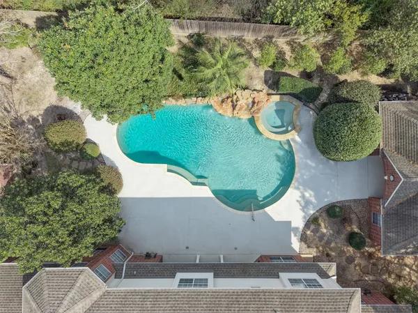 a view of a house with swimming pool