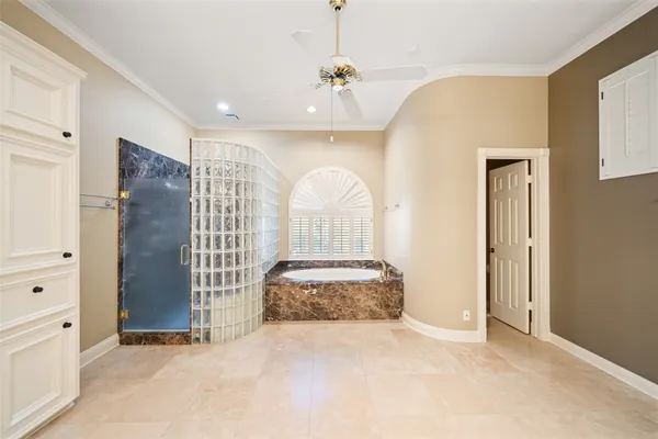 a room with furniture a dining table and chairs