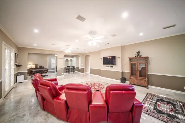 a bathroom with a toilet a sink and a mirror