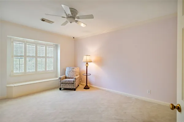 a spacious bathroom with a double vanity sink a large mirror and a bathtub