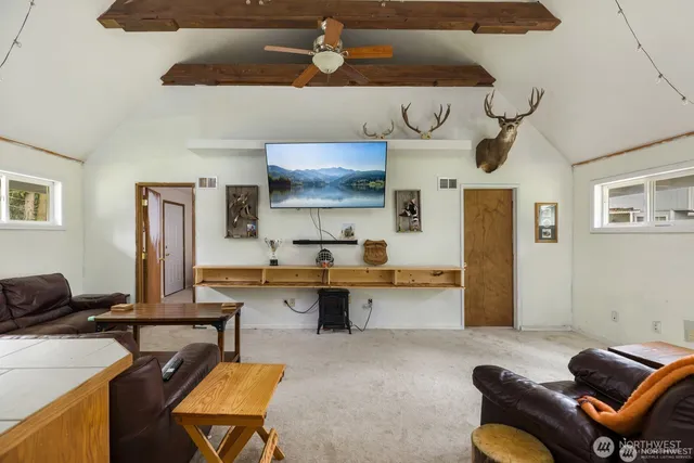 a kitchen with stainless steel appliances granite countertop a sink and cabinets