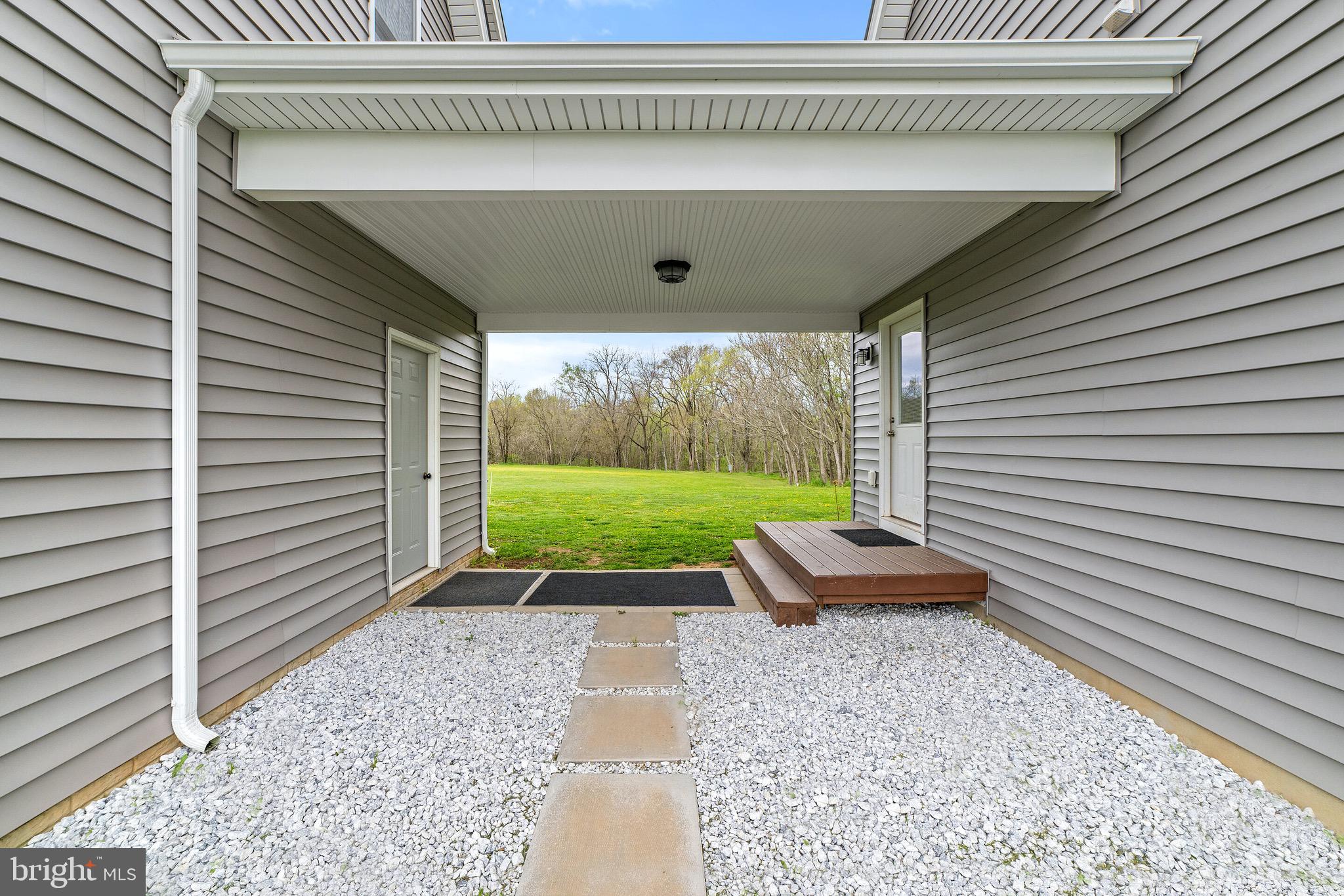 18178 Stevensburg Road Culpeper, VA 22701 - Photo 22 of 36 Breezeway side entrance-house on right & gar left