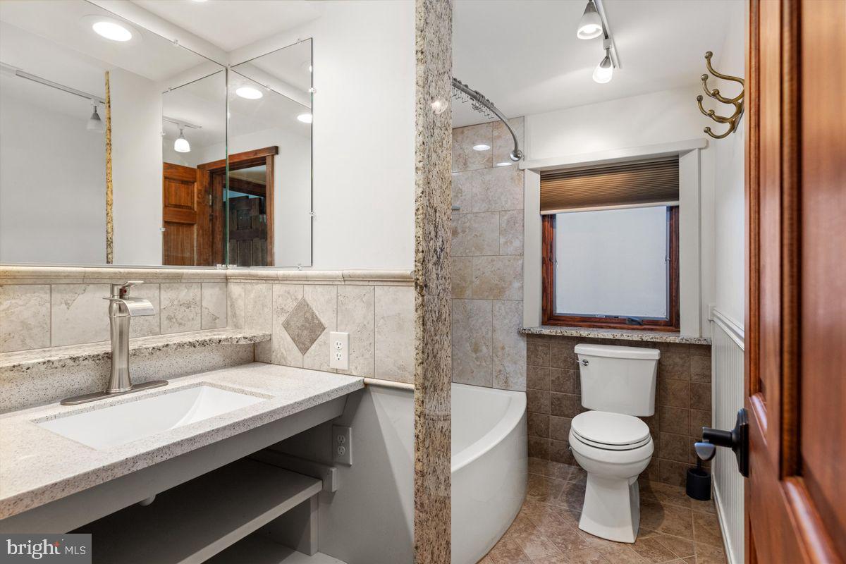 11 Beechnut Lane Willingboro, NJ 08046 - Photo 13 of 29 a bathroom with a toilet sink and mirror