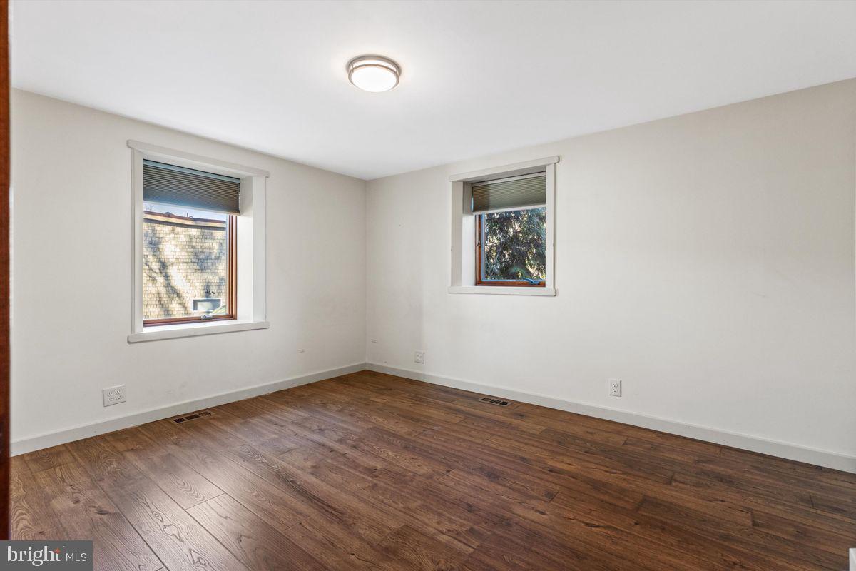 11 Beechnut Lane Willingboro, NJ 08046 - Photo 15 of 29 a view of an empty room with wooden floor and a window