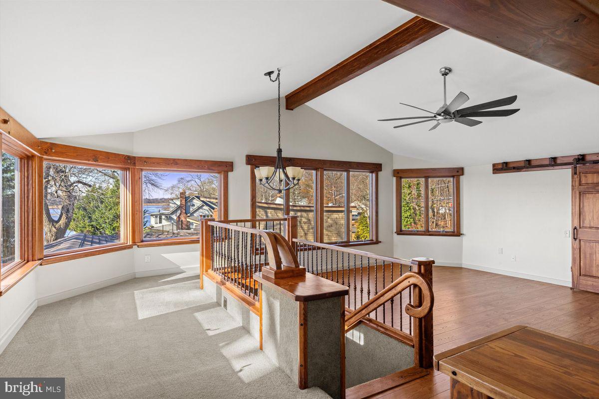 11 Beechnut Lane Willingboro, NJ 08046 - Photo 19 of 29 a living room with furniture a large window and a chandelier