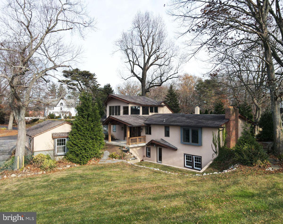 11 Beechnut Lane Willingboro, NJ 08046 - Photo 4 of 29 a view of a house with a yard covered with snow in front of house