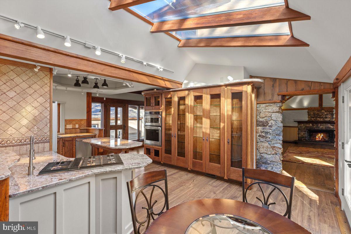 11 Beechnut Lane Willingboro, NJ 08046 - Photo 5 of 29 a room with granite countertop a sink and a refrigerator