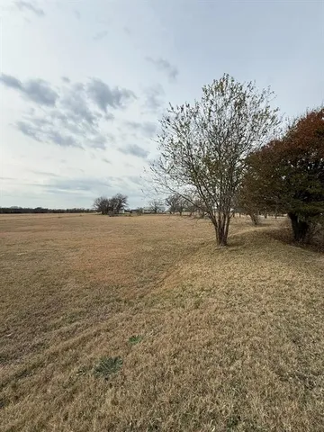 a view of mountain view with trees