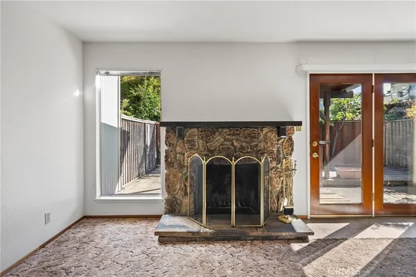 a view of a balcony with wooden floor