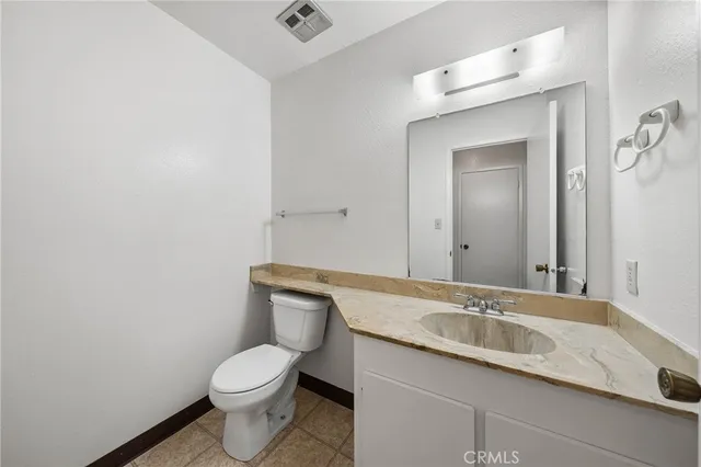 a aerial view of a house with swimming pool and lake view