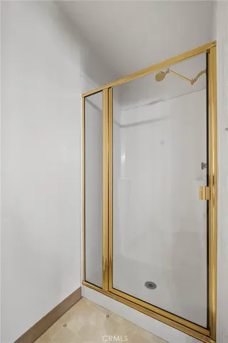 a view of a swimming pool with a patio and a garden