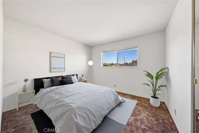 a view of a swimming pool with a lounge chairs