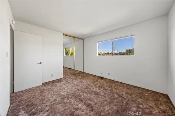 an aerial view of a house with swimming pool having outdoor seating