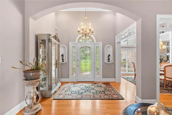 a kitchen with stainless steel appliances granite countertop a sink and stove top oven