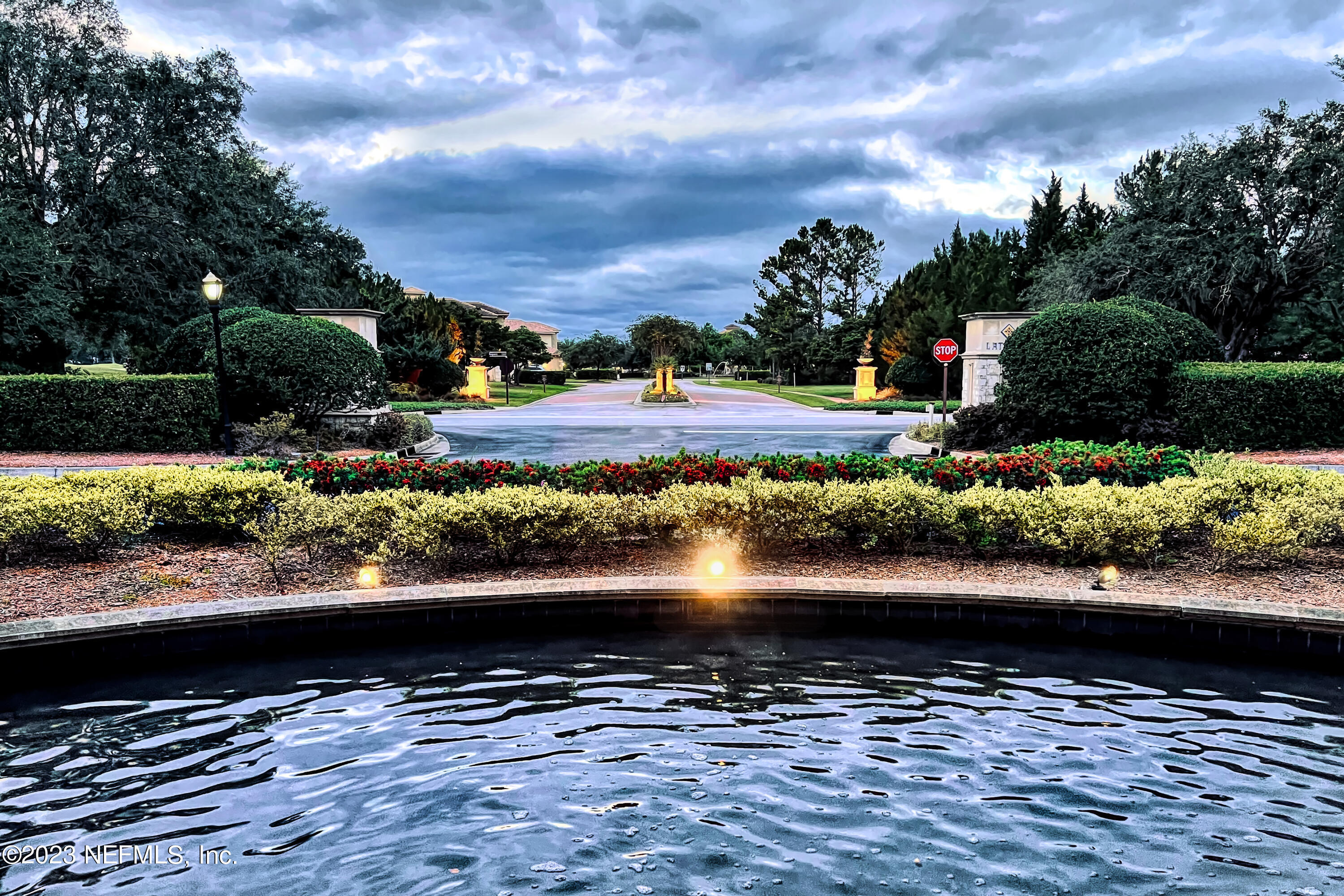 955 Registry Boulevard, Unit 317 St. Augustine, FL 32092 - Photo 16 of 29 a view of a lake from a yard