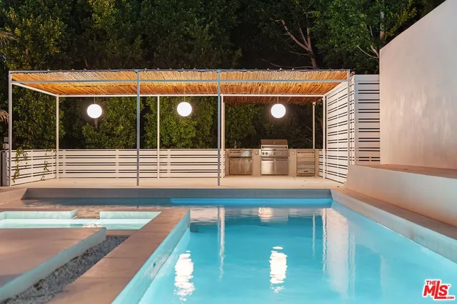 a view of a lobby with furniture and garden